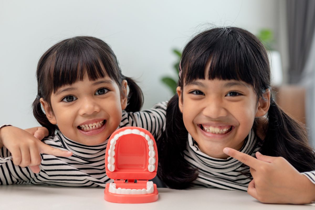 children showing teeth